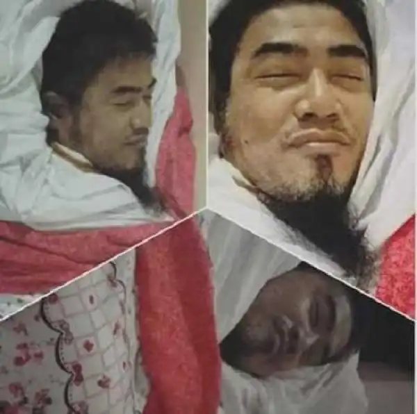 Impossible! Dead Islamic Cleric Seen Smiling Happily During His Own Burial (Shocking Photos)